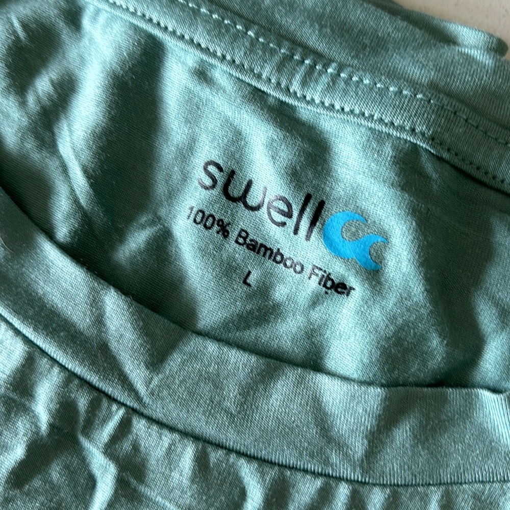 Swell short sleeve shirt.  Size men’s  Lg. 100% bamboo. Light teal green